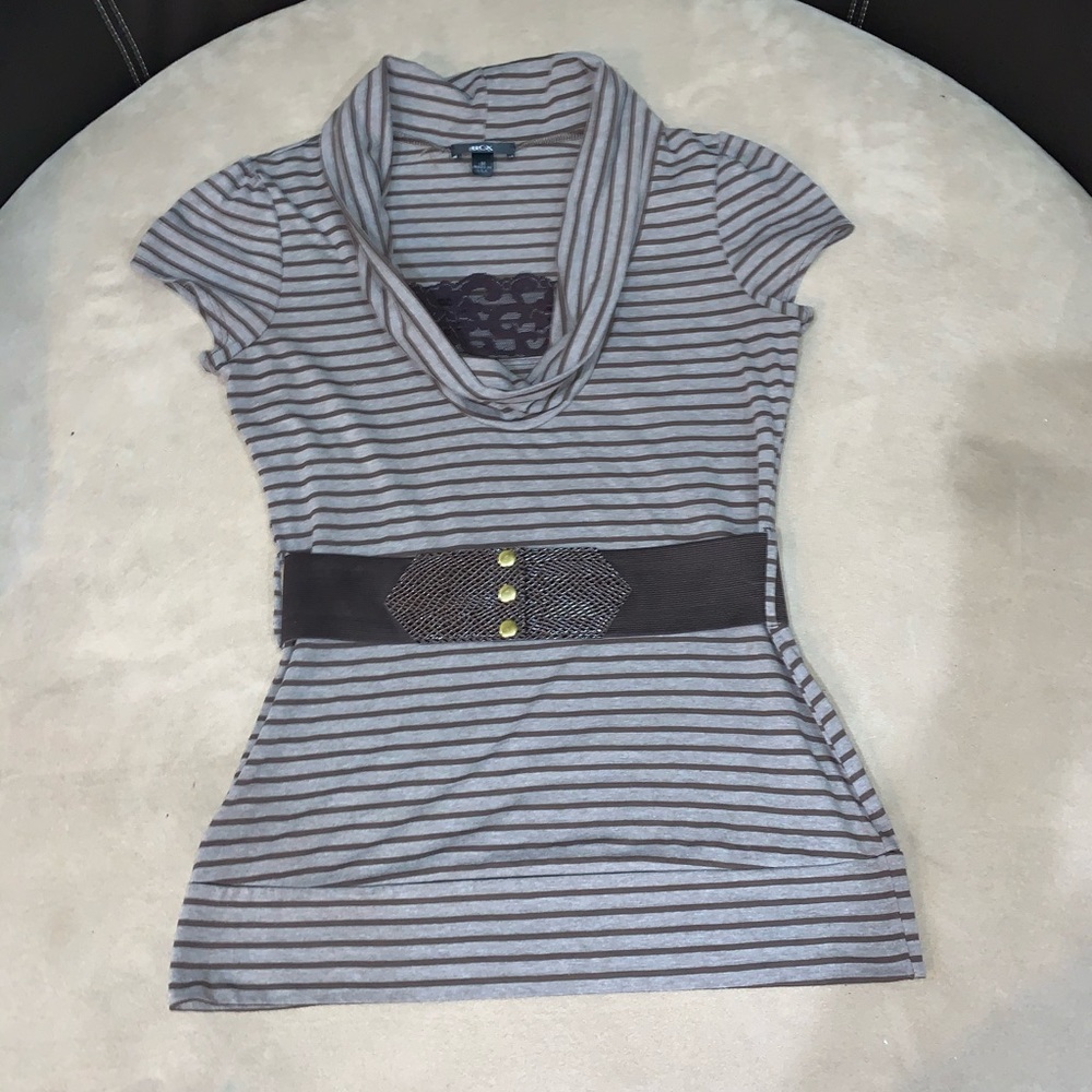 Cute woman’s blouse with belt